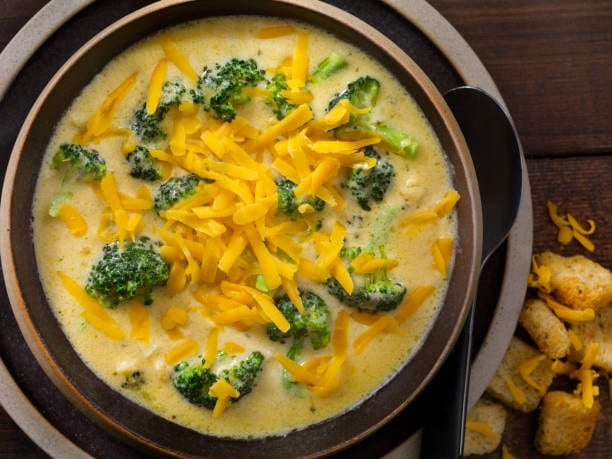 Broccoli & Cheddar Soup: Broccoli pairs beautifully with cheddar cheese in this hearty recipe. Begin by steaming broccoli florets until tender. In a separate pot, melt butter, whisk in flour to form a roux, and slowly add milk and vegetable broth to create a thick base. Add the broccoli, blend partially for texture, and stir in shredded cheddar until melted. This soup is rich in vitamin C and calcium, making it excellent for bone health and immunity while offering a comforting, indulgent flavor. Broccoli & Cheddar Soup: Broccoli pairs beautifully with cheddar cheese in this hearty recipe. Begin by steaming broccoli florets until tender. In a separate pot, melt butter, whisk in flour to form a roux, and slowly add milk and vegetable broth to create a thick base. Add the broccoli, blend partially for texture, and stir in shredded cheddar until melted. This soup is rich in vitamin C and calcium, making it excellent for bone health and immunity while offering a comforting, indulgent flavor.
