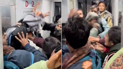 The 19-second clip shows passengers on board panicking as some get accidentally hit during the tussle.