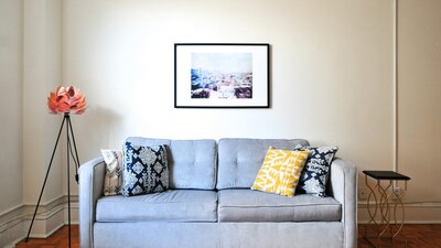 Create negative space with large art pieces to let the room breathe