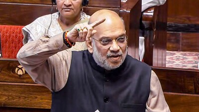 Union Home Minister Amit Shah speaks in the Lok Sabha during the winter session of Parliament, in New Delhi, on Wednesday. (Image: Sansad TV via PTI)