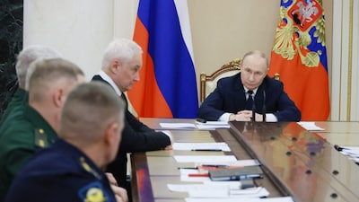 Russia's President Vladimir Putin chairs a meeting in Moscow. (Photo: POOL via AFP)