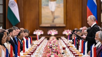 President Droupadi Murmu with Russian President Vladimir Putin during a state banquet at Rashtrapati Bhavan in New Delhi. (PTI photo)