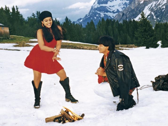 Switzerland: Zara Sa Jhoom Loon Main from DDLJ sprinkled pure Bollywood magic across Switzerland, capturing postcard-perfect locations like Fribourg, Saanen, and Gstaad. Kajol and Shah Rukh Khan twirl through the charming Saanen railway station, play in the snow-covered Alps, and even dash into Gstaad’s famous Early Beck bakery. The unforgettable train-missing scene, shot at Zweisimmen station remains a quintessential blend of Bollywood romance and Swiss countryside charm.