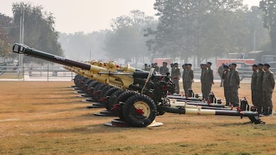 Artillery units execute a 21-gun salute during rehearsals for the Republic Day parade. (PTI)