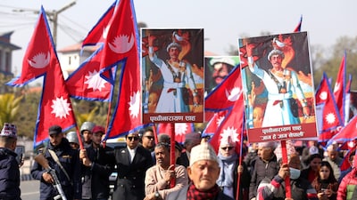 Supporters of Nepal’s former royal family rallied in Kathmandu, demanding its restoration ahead of elections. (AP Photo/Subash Shrestha)