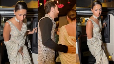 Alia Bhatt and Ranbir Kapoor arrive hand in hand at a friend’s wedding reception in Mumbai.