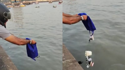 The foreigner questions the man, but he offers no response.  (Photo Credit: X)