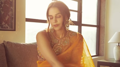 Check out Neha Dhupia's orange saree look. (Photo Credit: Instagram)