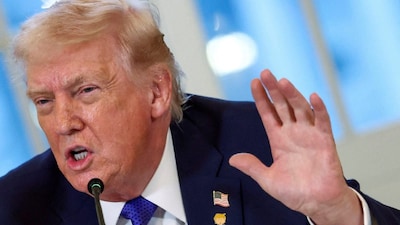 US President Donald Trump wearing a "happy Trump" pin speaks during a meeting with oil industry executives at the White House in Washington, DC, US. (IMAGE: REUTERS) 