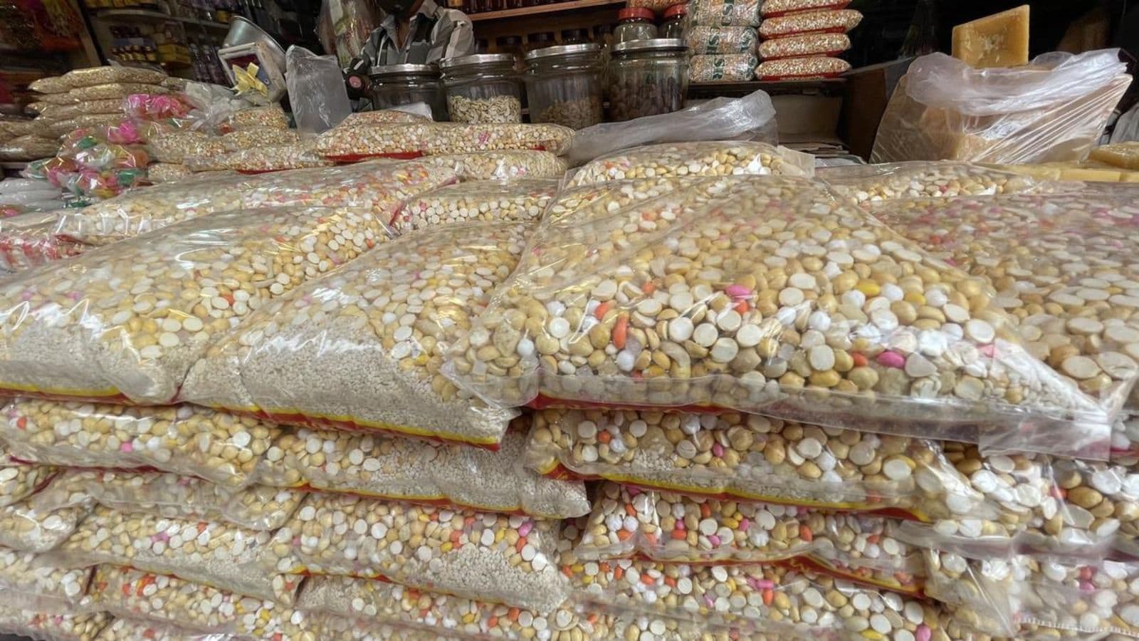 Neatly stacked packets of Ellu Mixture For sale in various markets of Bengaluru.