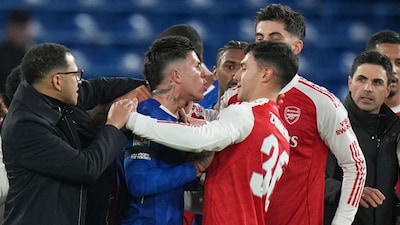 Liam Rosenior breaking up a fight after Chelsea's loss to Arsenal (Credit: AP)