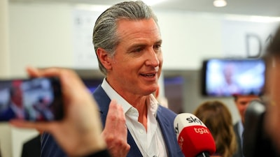 California Governor Gavin Newsom speaks to the media as he attends the 56th annual World Economic Forum (WEF) meeting in Davos, Switzerland. (IMAGE: REUTERS)