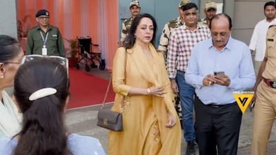 Hema Malini responds to trolls by smiling after voting in BMC elections. (Photo: Viral Bhayani)