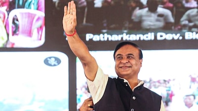 Assam CM Himanta Biswa Sarma waves to the gathering during an event. (X/@himantabiswa)