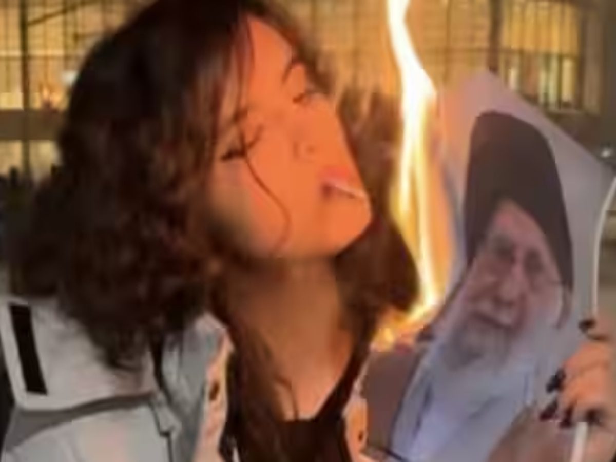 What's Behind Videos Of Iranian Women Using Khamenei's Burning ...