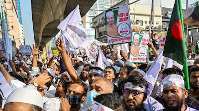 Jamaat-e-Islami party supporters rally in Dhaka on November 11, 2025, demanding the provision of legal status to the 'July Charter' and its ratification by a referendum ahead of Bangladesh's national elections. (IMAGE: AFP FILE)