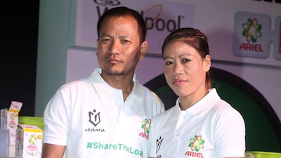 Karung Onkholer (left) and MC Mary Kom. (AFP Photo)