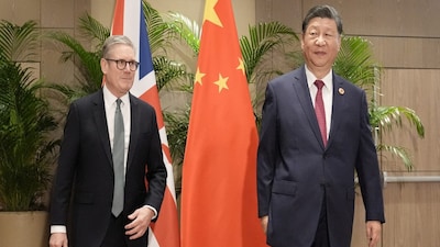 British Prime Minister Keir Starmer with President Xi Jinping of China. (Pool via REUTERS)