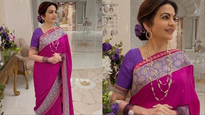 Nita Ambani paired her saree with exquisite pearl and diamond jewellery. 