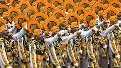 CISF contingent marches during rain-affected full-dress rehearsal for the Republic Day Parade, in New Delhi (Photo: PTI)