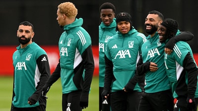 Mo Salah back in training with his Liverpool teammates (AFP)