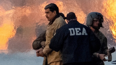 Captured Venezuelan President Nicolas Maduro is escorted, as he heads towards the Daniel Patrick Manhattan United States Courthouse for an initial appearance to face U.S. federal charges at Downtown Manhattan Heliport, in New York City, US. (IMAGE: REUTERS)