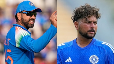 Rohit Sharma advises Kuldeep Yadav.(PC: AP, AFP)