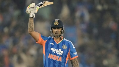 Suryakumar Yadav raises his bat after scoring 50 in 2nd T20I against New Zealand. (Picture Credit: AFP)