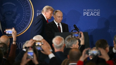 US President Donald Trump and Russian President Vladimir Putin arrive to hold a joint press conference after participating in a US-Russia summit on Ukraine at Joint Base Elmendorf-Richardson in Anchorage, Alaska. (IMAGE: AFP FILE) 