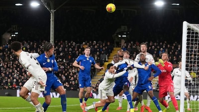 Chelsea's Liam Delap, third from left, challenges to score his side's first goal during the English Premier League soccer match between Fulham and Chelsea in London, Wednesday, Jan. 7, 2026. (AP Photo/Dave Shopland)