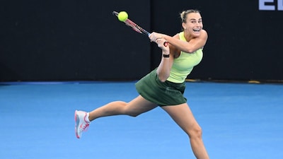 Aryna Sabalenka of Belarus plays a backhand return to Madison Keys of the United States during their quarterfinal match at the Brisbane International in Brisbane, Australia, Friday, Jan. 9, 2026. (Darren England/AAP Image via AP)