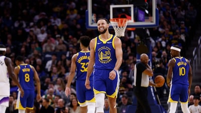 Golden State Warriors guard Stephen Curry (30) reacts in the third quarter during an NBA basketball game against the Utah Jazz in San Francisco, Saturday, Jan. 3, 2026. (Santiago Mejia/San Francisco Chronicle via AP)