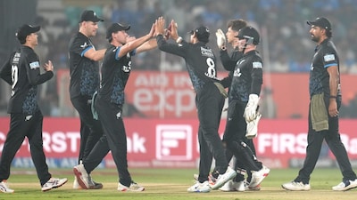 New Zealand's captain Mitchel Santner celebrates the dismissal of India's Hardik Pandya with his teammates during the fourth T20 cricket match between India and New Zealand in Visakhapatnam, India, Wednesday, Jan. 28, 2026. (AP Photo/Aijaz Rahi)