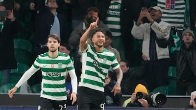 Sporting's Luis Suarez, right, celebrates after scoring his side's second goal during the Champions League opening phase soccer match between Sporting CP and Paris Saint-Germain, in Lisbon, Tuesday, Jan. 20, 2026. (AP Photo/Armando Franca)