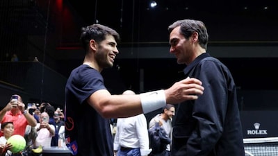 Carlos Alcaraz, Roger Federer. (x) 