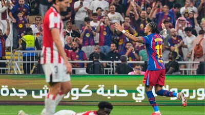 Barcelona's Raphinha celebrates after scoring the fifth goal during the Spanish Super Cup semifinal soccer match against Athletic Club Bilbao at King Abdullah Sports City Stadium in Jeddah, Saudi Arabia, Wednesday, Jan. 7, 2026. (AP Photo/Altaf Qadri)
