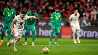 Morocco's Brahim Abdelkader Díaz takes and misses a penalty kick during the Africa Cup of Nations final soccer match between Senegal and Morocco, in Rabat, Morocco, Sunday, Jan. 18, 2026. (AP Photo/Mosa'ab Elshamy)