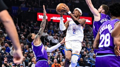 Oklahoma City Thunder guard Shai Gilgeous-Alexander (2) shoots against Utah Jazz during the first half of an NBA basketball game, Wednesday, Jan. 7, 2025, in Oklahoma City. (AP Photo/Gerald Leong)