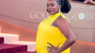 Wunmi Mosaku cradled her baby bump while posing on the red carpet. (Photo Credit : Instagram)