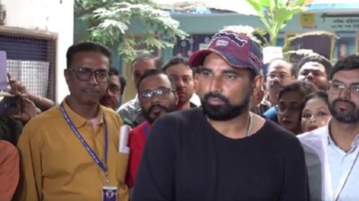 Cricketer Mohammed Shami leaves from Swarnamoyee Vidyalaya after SIR hearing on Tuesday. (PTI)