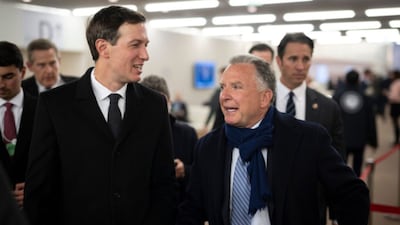 Jared Kushner, left, and Steve Witkoff walk in the corridors during the 56th annual meeting of the World Economic Forum, WEF, in Davos, Switzerland, Tuesday. (AP)