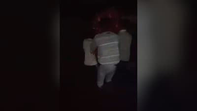 Four young men had entered the water to immerse the idol.