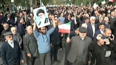 The Iranian regime organised large-scale pro-government rallies across major cities, where participants were seen waving national flags and chanting slogans that denounced the anti-government protesters as "terrorists". (Image: AFP)