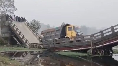 A goods-laden dumper was crossing the bridge when it collapsed. (Photo: X)