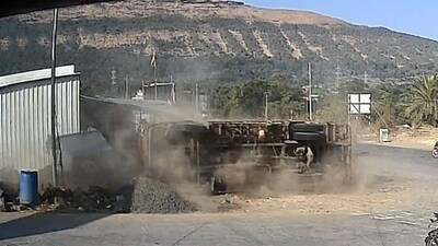 The truck crashed into several shops while trying to avoid a collision with a two-wheeler.