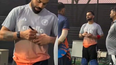 Virat Kohli autographs a ball for a net bowler (Picture credit: Screengrab from X)