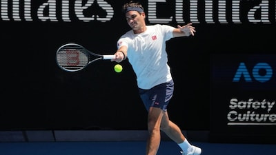Roger Federer plays a forehand return to Casper Ruud (Picture credit: AP)