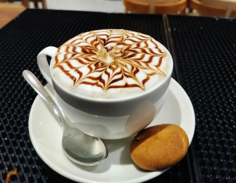 For anyone who believes coffee should also feel like dessert, there is the café mocha. This drink brings chocolate into the picture that instantly makes everything better. It combines espresso, steamed milk and chocolate syrup or cocoa, often topped with foam or whipped cream. The name traces back to Mocha in Yemen which is famous for beans with naturally chocolatey notes. Today, it is more about flavour than geography. For anyone who believes coffee should also feel like dessert, there is the café mocha. This drink brings chocolate into the picture that instantly makes everything better. It combines espresso, steamed milk and chocolate syrup or cocoa, often topped with foam or whipped cream. The name traces back to Mocha in Yemen which is famous for beans with naturally chocolatey notes. Today, it is more about flavour than geography.