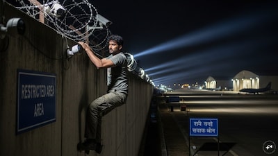 The man fractured his leg after jumping into the restricted area and was admitted to a hospital at Lohegaon. (AI-generated image)