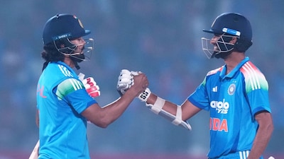 KL Rahul (left) and Washington Sundar celebrate India's four-wicket win in Vadodara. (AP Photo)